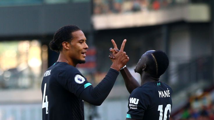 Sadio Mane celebrates scoring Liverpool's second goal with Virgil van Dijk