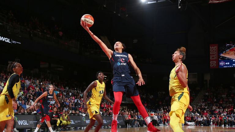Aerial Powers rises to score against the Seattle Storm