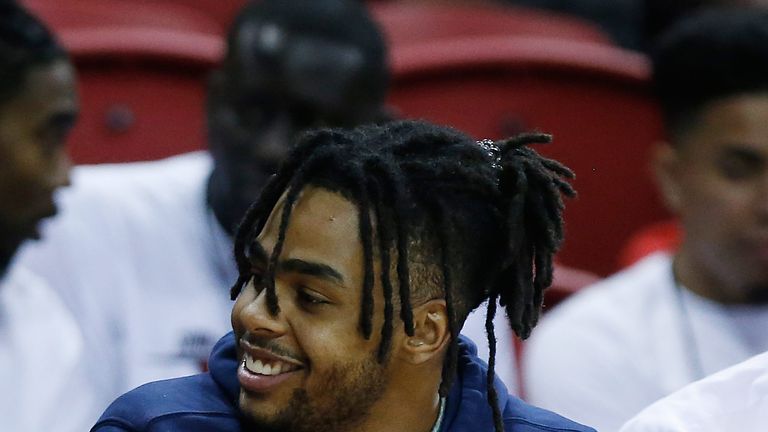New Warriors signing D'Angelo Russell on the sidelines at NBA Summer League
