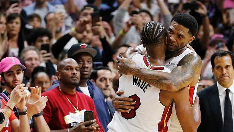 Long-time friends Dwyane Wade and Udonis Haslem embrace 