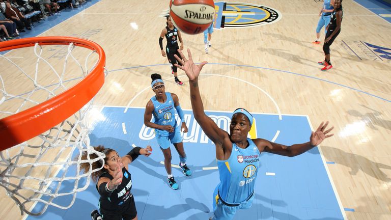 Jantel Lavender lofts a floater for the Chicago Sky