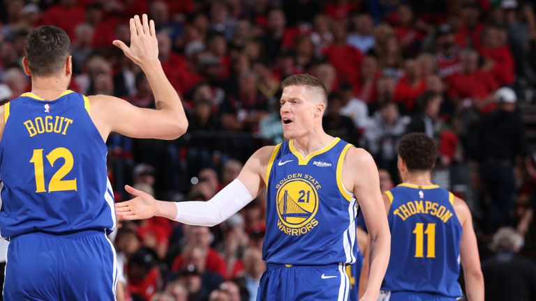 Jonas Jerebko celebrates a play for the Warriors