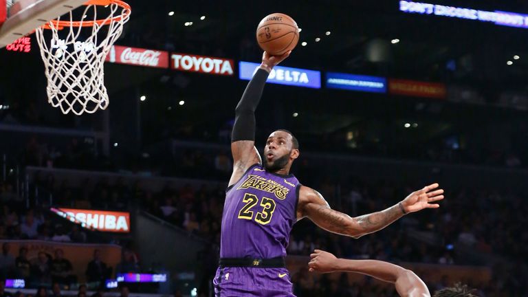 LeBron James hammers home a dunk for the Los Angeles Lakers