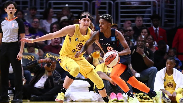 Sydney Wiese shits down Courtney Williams in the Sparks' victory over the Connecticut Sun
