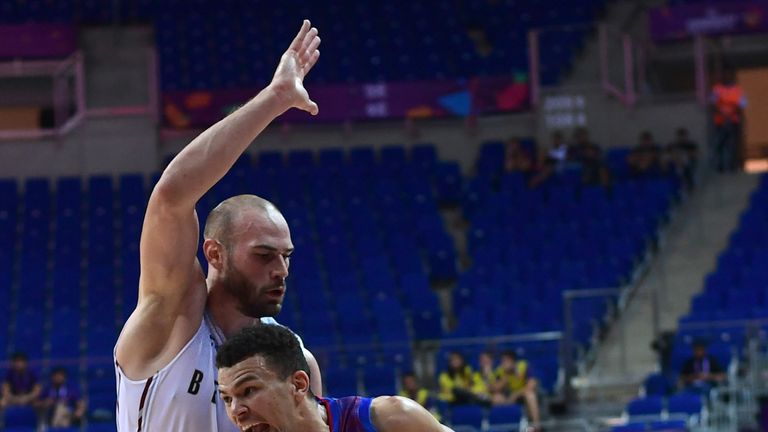 Luke Nelson drives to the basket for Great Britain