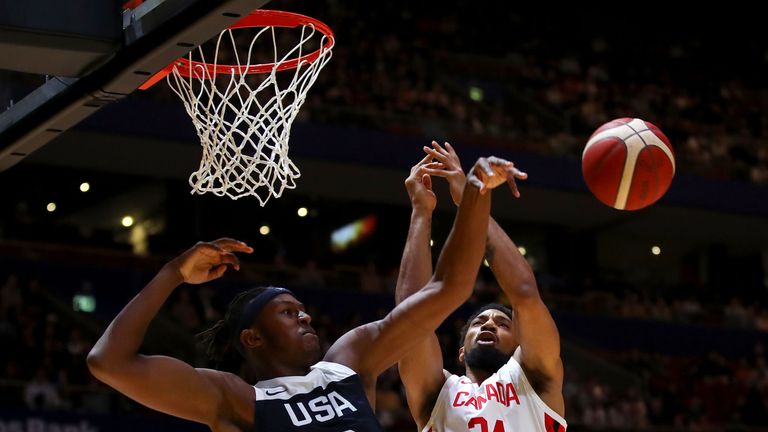 Myles Turner competes for a rebound against Canada
