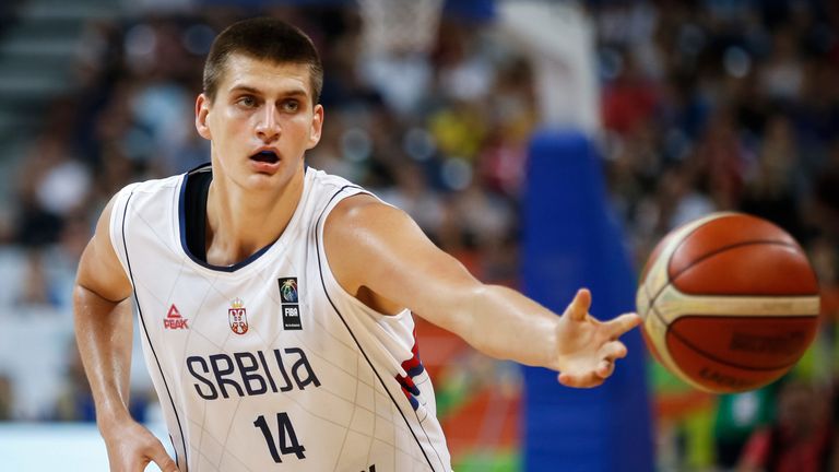 Nikola Jokic dishes a pass for Serbia