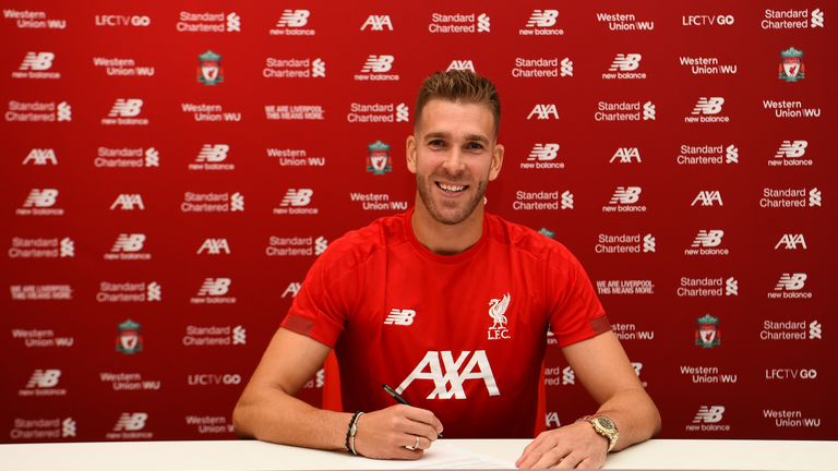 Liverpool unveil new signing Adrian