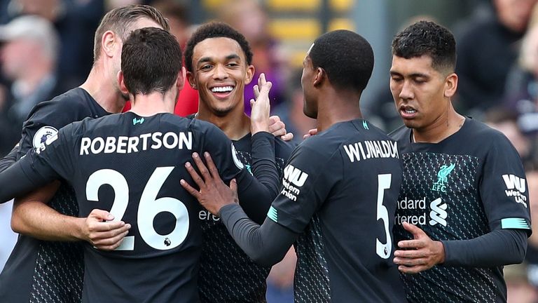 Trent Alexander-Arnold is congratulated after his cross forced an own goal from Burnley striker Chris Wood