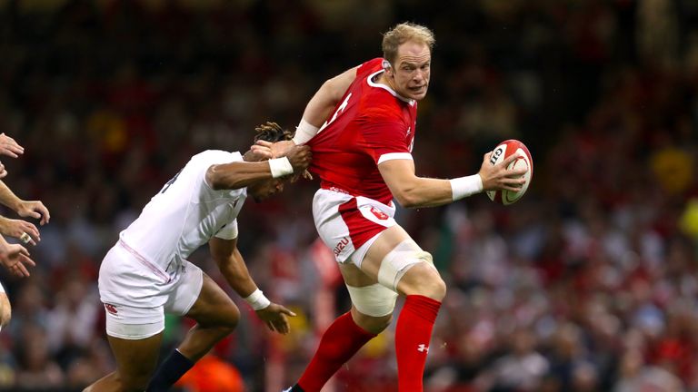 Wales' Alun Wyn Jones (right) and England's Anthony Watson battle for the ball during the International Friendly at The Principality Stadium, Cardiff. PRESS ASSOCIATION Photo. Picture date: Saturday August 17, 2019. See PA story RUGBYU Wales. Photo credit should read: David Davies/PA Wire. RESTRICTIONS: Use subject to restrictions. Editorial use only. No commercial use. No use in books or print sales without prior permission.
