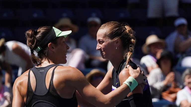 Andrea Petkovic (L) of Germany reacts after defeating Petra Kvitova of Czech Republic during their Round 2 women's Singles match at the 2019 US Open at the USTA Billie Jean King National Tennis Center in New York on August 29, 2019.