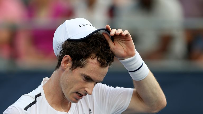 Andy Murray looks on while playing with his brother Jamie Murray of Great Britain during their doubles match against Raven Klaasen of Russia and Michael Venus of New Zealand during Day 5 of the Citi Open at Rock Creek Tennis Center on August 02, 2019 in Washington, DC