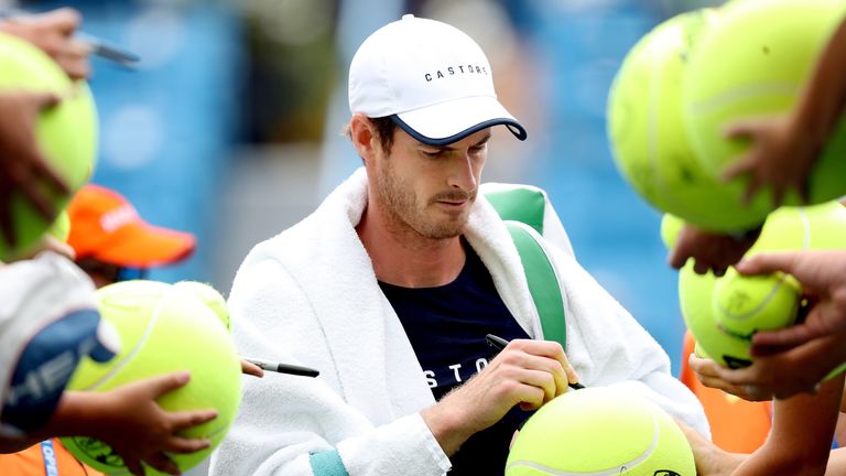 Andy Murray of Great Britain signs autographs after a training session on center court during the Western & Southern Open at Lindner Family Tennis Center on August 12, 2019 in Mason, Ohio