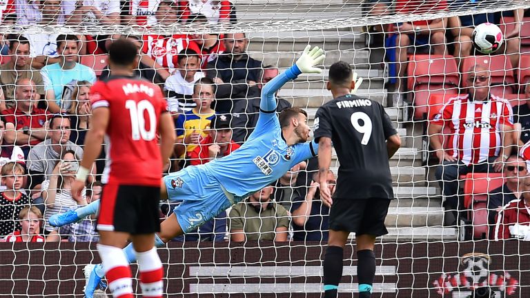 Angus Gunn is unable to prevent Liverpool taking the lead