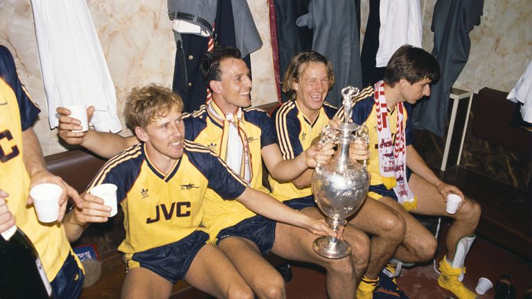 Kevin Richardson, Steve Bould, Paul Merson toast the famous win at Anfield