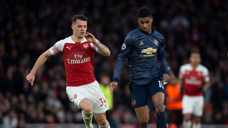 LONDON, ENGLAND - MARCH 10: Granit Xhaka of Arsenal and Marcus Rashford of Manchester United during the Premier League match between Arsenal FC and Manchester United at Emirates Stadium on March 10, 2019 in London, United Kingdom. (Photo by Visionhaus/Getty Images)