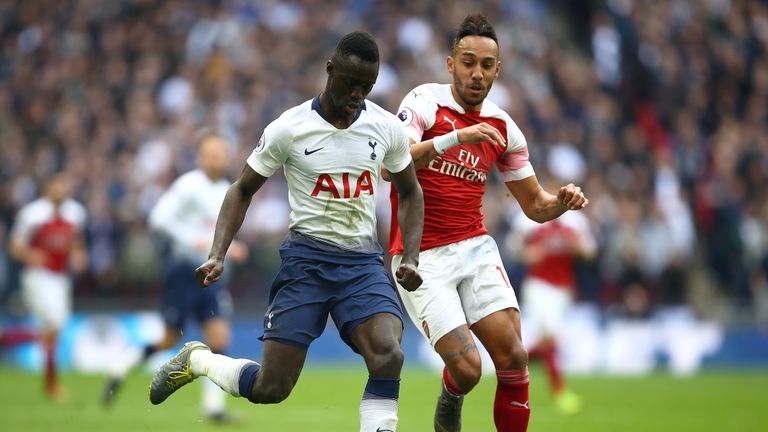 Pierre-Emerick Aubameyang and Davinson Sanchez battle for possession during last season's north London derby at Wembley