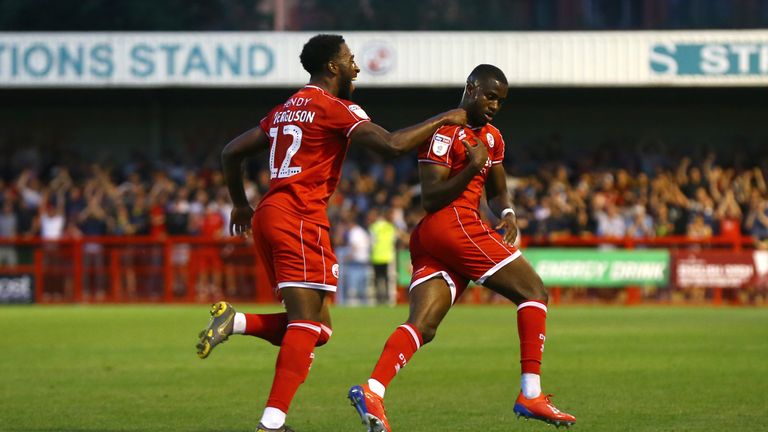 Crawley Town's Beryly Lubala (right) celebrates scoring his side's first goal of the game with team mates during the Carabao Cup Second Round match at The People's Pension Stadium, Crawley. PRESS ASSOCIATION Photo. Picture date: Tuesday August 27, 2019. See PA story SOCCER Crawley. Photo credit should read: Gareth Fuller/PA Wire. RESTRICTIONS: EDITORIAL USE ONLY No use with unauthorised audio, video, data, fixture lists, club/league logos or "live" services. Online in-match use limited to 120 images, no video emulation. No use in betting, games or single club/league/player publications.