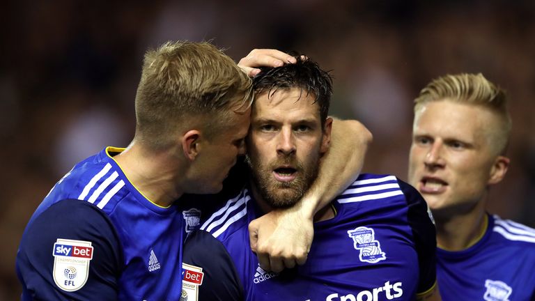 Birmingham City's Lukas Jutkiewicz (centre) celebrates scoring his side's first goal of the game with team mate Kristian Pedersen (left) and Marc Roberts (right)