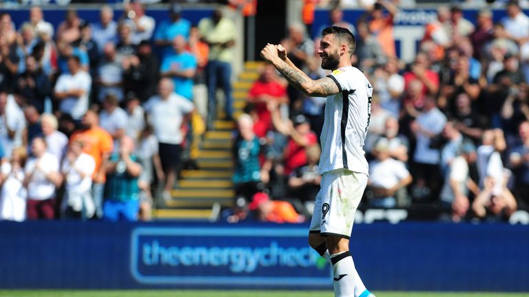 Borja Baston celebrates scoring his Swansea's third goal against Birmingham