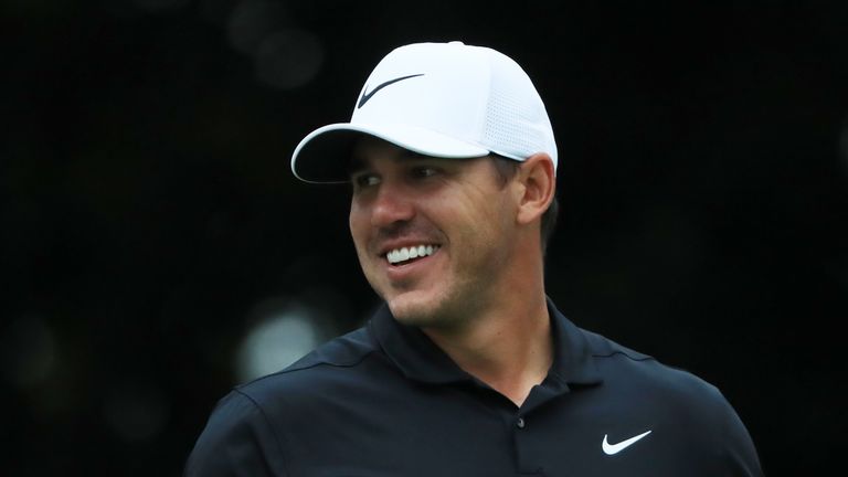 Brooks Koepka of the United States smiles during the continuation of the weather delayed third round of the TOUR Championship at East Lake Golf Club on August 25, 2019 in Atlanta, Georgia.