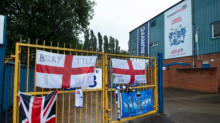 Banners and messages of support left outside Gigg Lane following Bury's expulsion from the Football League