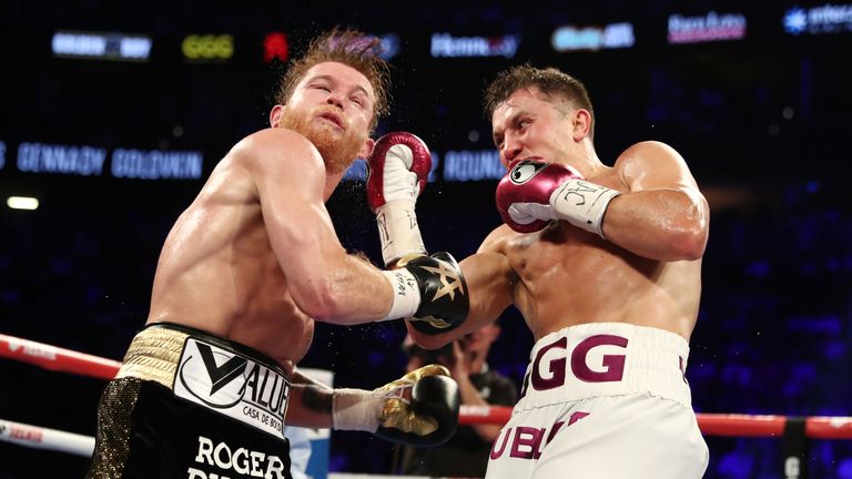 Gennady Golovkin (L) and Canelo Alvarez battle during their WBC/WBA middleweight title fight at T-Mobile Arena on September 15, 2018 in Las Vegas, Nevada.