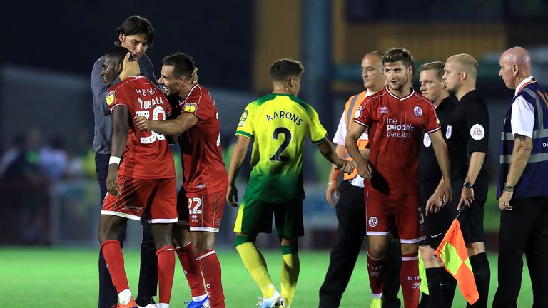 Crawley Town manager Gabriele Cioffi (left) embraces Beryly Lubala and Filipe Morais after the final whistle during the Carabao Cup Second Round match at The People's Pension Stadium, Crawley. PRESS ASSOCIATION Photo. Picture date: Tuesday August 27, 2019. See PA story SOCCER Crawley. Photo credit should read: Gareth Fuller/PA Wire. RESTRICTIONS: EDITORIAL USE ONLY No use with unauthorised audio, video, data, fixture lists, club/league logos or "live" services. Online in-match use limited to 120 images, no video emulation. No use in betting, games or single club/league/player publications.