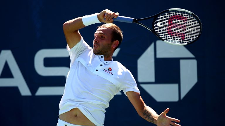 Dan Evans of Great Britain returns a shot during his Men's Singles second round match against Lucas Pouille of France on day four of the 2019 US Open at the USTA Billie Jean King National Tennis Center on August 29, 2019 in Queens borough of New York City