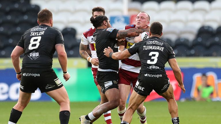 Dan Sarginson is tackled by Hull FC's Albert Kelly