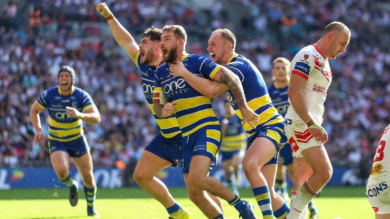 Lance Todd Trophy winner Daryl Clark celebrates the game-clinching try for Warrington