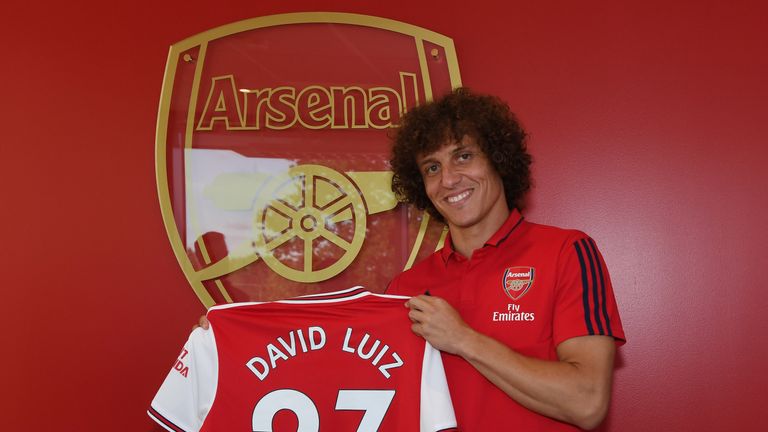 David Luiz poses during a photoshoot at London Colney