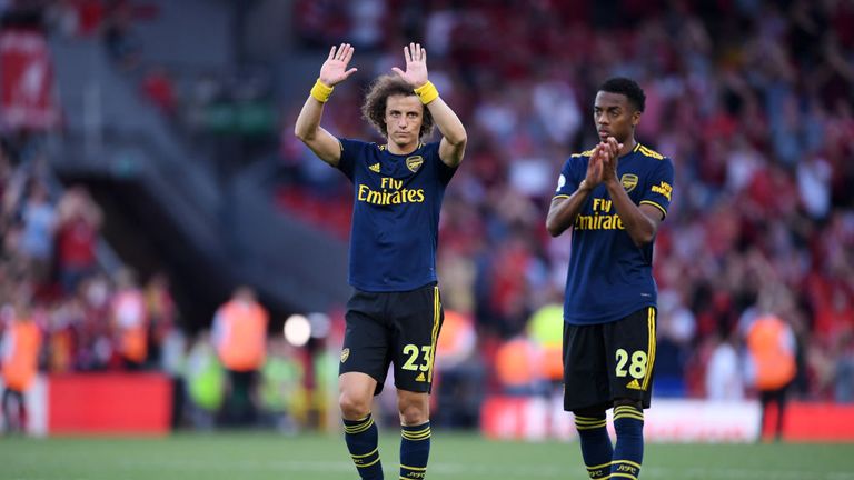 David Luiz holds his hands up to Arsenal fans after the defeat