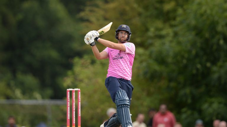 Dawid Malan's unbeaten 91 proved decisive as Middlesex defeated Gloucestershire under the Duckworth-Lewis-Stern system