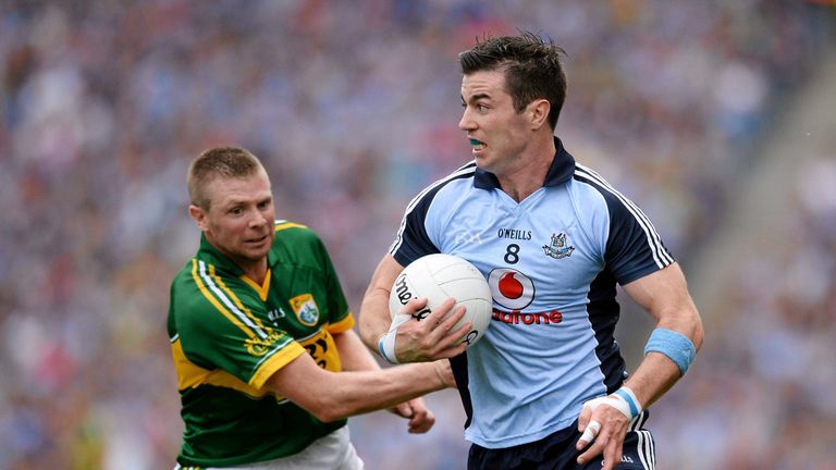 Michael Darragh Macauley in action against Tomás Ó Sé during the 2013 All-Ireland semi-final