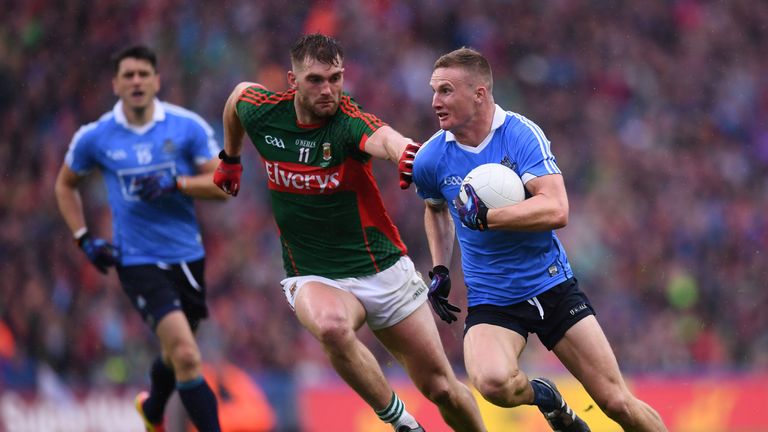 Ciarán Kilkenny battles with Aidan O'Shea during the 2016 decider