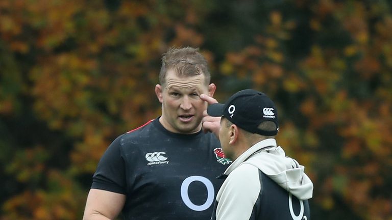 Dylan Hartley speaks to Eddie Jones during the England captain's run at Pennyhill Park on November 16, 2018 in Bagshot, England.