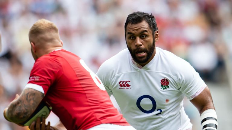 Billy Vunipola preparing to tackle Ross Moriarty at Twickenham 