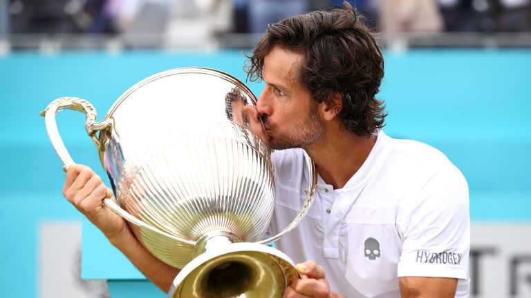 Feliciano Lopez celebrated a memorable double triumph at Queen's Club 