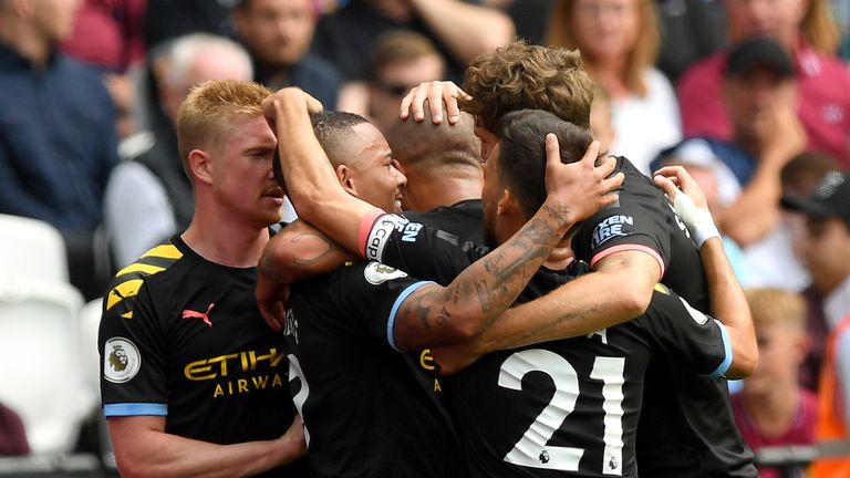 Gabriel Jesus is mobbed by teammates after giving Manchester City the lead
