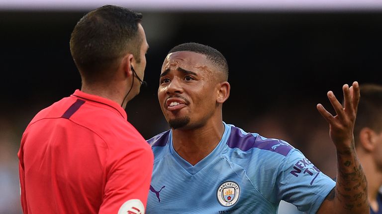 Manchester City's Brazilian striker Gabriel Jesus (R) remonstrates with English referee Michael Oliver after his goal was dissallowed following a VAR decision during the English Premier League football match between Manchester City and Tottenham Hotspur at the Etihad Stadium in Manchester, north west England, on August 17, 2019.