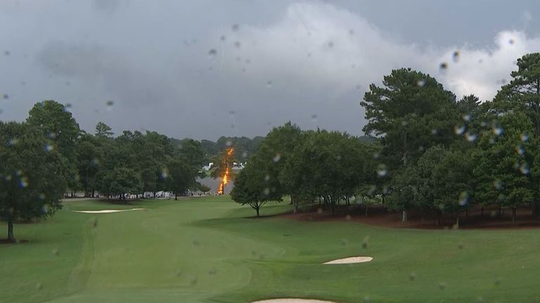 Six people were injured at the Tour Championship after lightning struck a pine tree right after play was suspended.