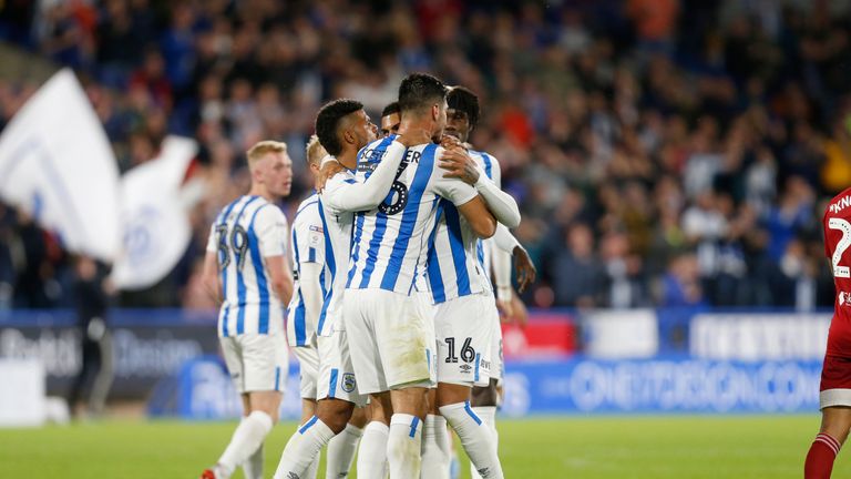 Karlan Grant celebrates his goal against Fulham with Huddersfield team-mates