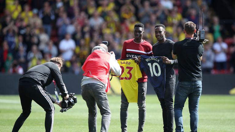 Ismaila Sarr and Danny Welbeck are presented by Watford