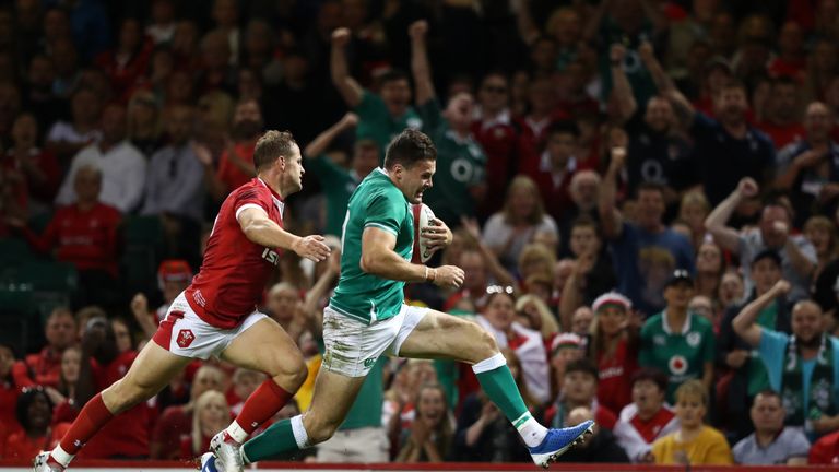 CARDIFF, WALES - AUGUST 31: Ireland wing Jacob Stockdale outpaces Hallam Amos to score the second Ireland try during the International match between Wales and Ireland at Principality Stadium on August 31, 2019 in Cardiff, Wales. (Photo by Stu Forster/Getty Images)