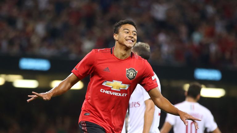 Jesse Lingard celebrates scoring for Manchester United against AC Milan