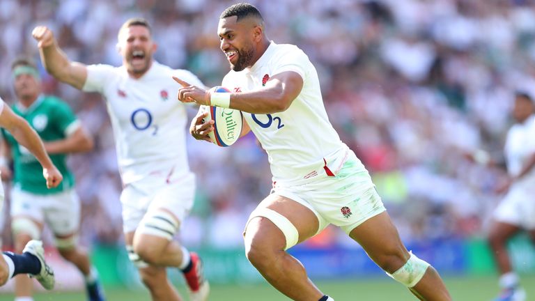 Joe Cokanasiga goes over the first of his two tries against Ireland