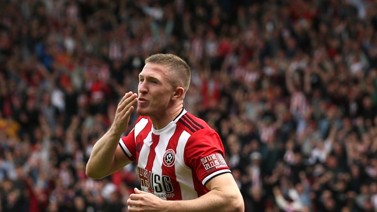 SHEFFIELD, ENGLAND - AUGUST 18: John Lundstram of Sheffield United celebrates after scoring his team's first goal during the Premier League match between Sheffield United and Crystal Palace at Bramall Lane on August 18, 2019 in Sheffield, United Kingdom. (Photo by Jan Kruger/Getty Images)