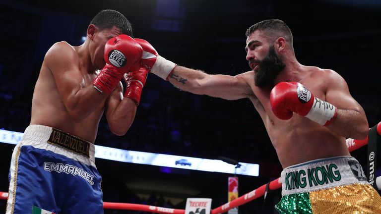 August 24, 2019; Hermosillo, Sonora, MEX; Jono Carroll and Eleazar Valenzuela during their August 24, 2019 fight at the Centro de Usos M..ltiples in Hermosillo, Sonora. Mandatory Credit: Ed Mulholland/Matchroom Boxing USA