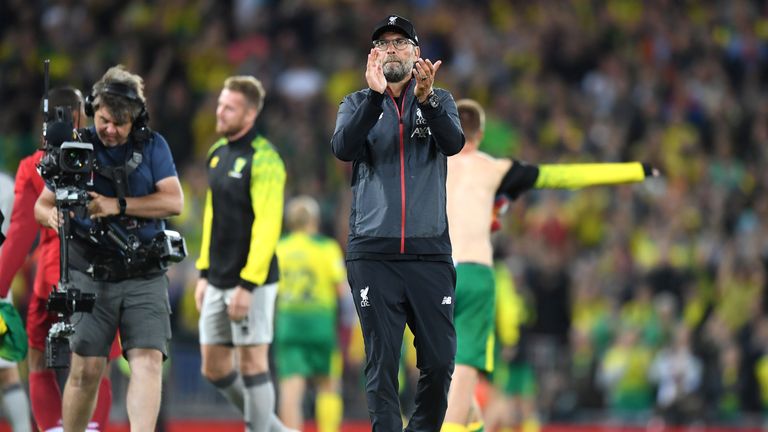 Jurgen Klopp applauds supporters following the 4-1 win over Norwich City